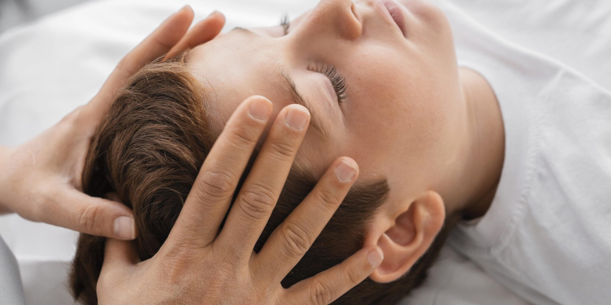 female-osteopathist-treating-boy-hospital